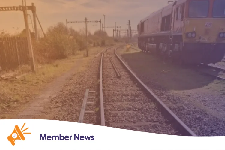 An image of a train and some train tracks