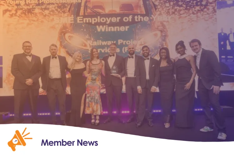 A group of people collecting an award