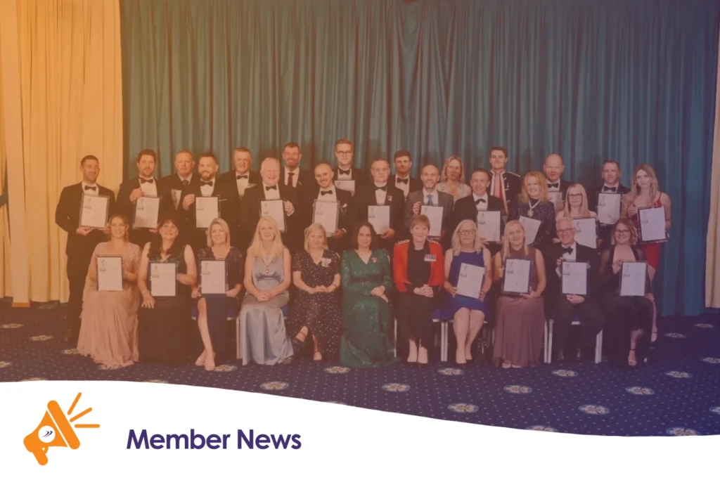 A group of people collecting an award