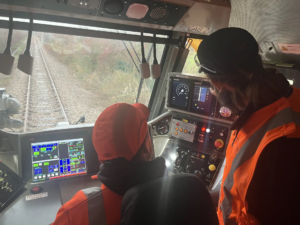 An image of two conductors in a train